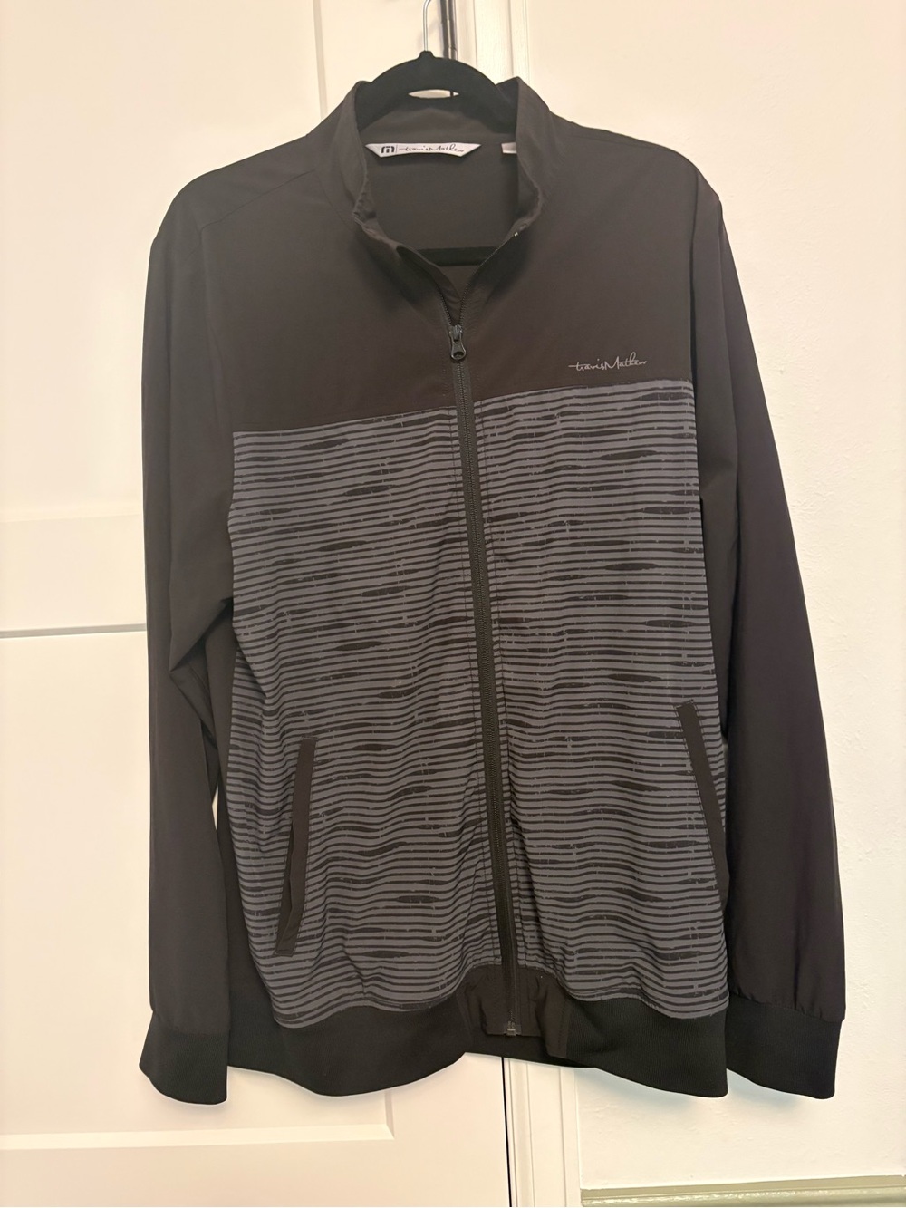 Travis Mathew golf windbreaker
